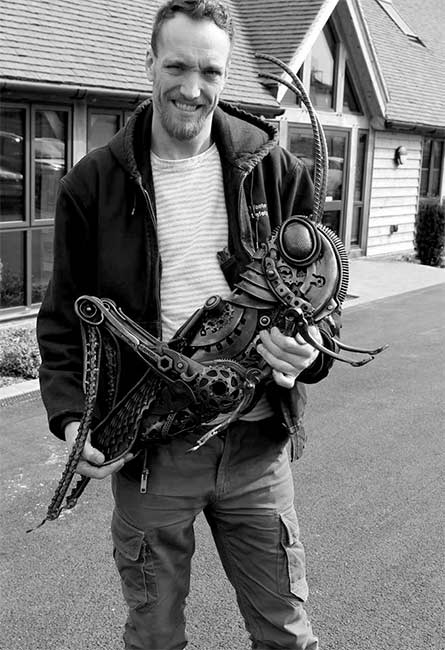 Original metal sculpture by Alan Williams constructed from reclaimed mechanical materials and forged steel