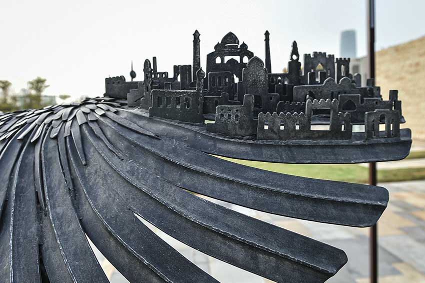Laser-cut Kuwaiti architectural elements in the wings of Alan Williams’ Time Migration sculpture